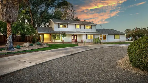 Dusk photo of a home on E Herndon Ave, Clovis