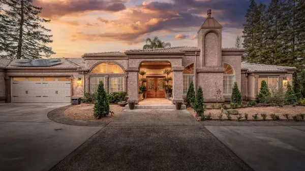Twilight cover photo of a luxury home on N Tahan Ave, Fresno